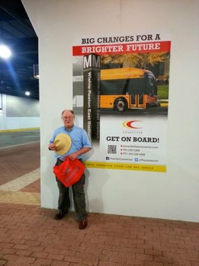Jeff in front of Station Poster